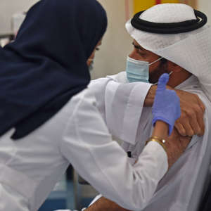 Saudi Arabia's Health Minister, Tawfiq al-Rabiah, received the COVID-19 vaccine in Riyadh in December 2020.